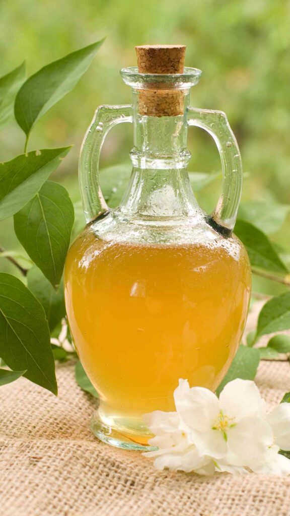 A-bottle-of-apple-cider-use-for-treating-dandruff-at-home