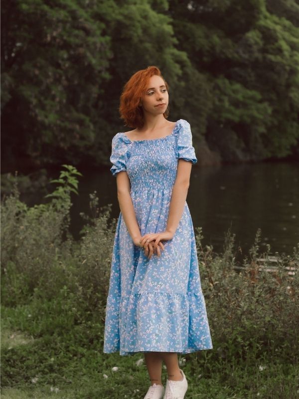 A-young-woman-wearing-blue-linen-dress
