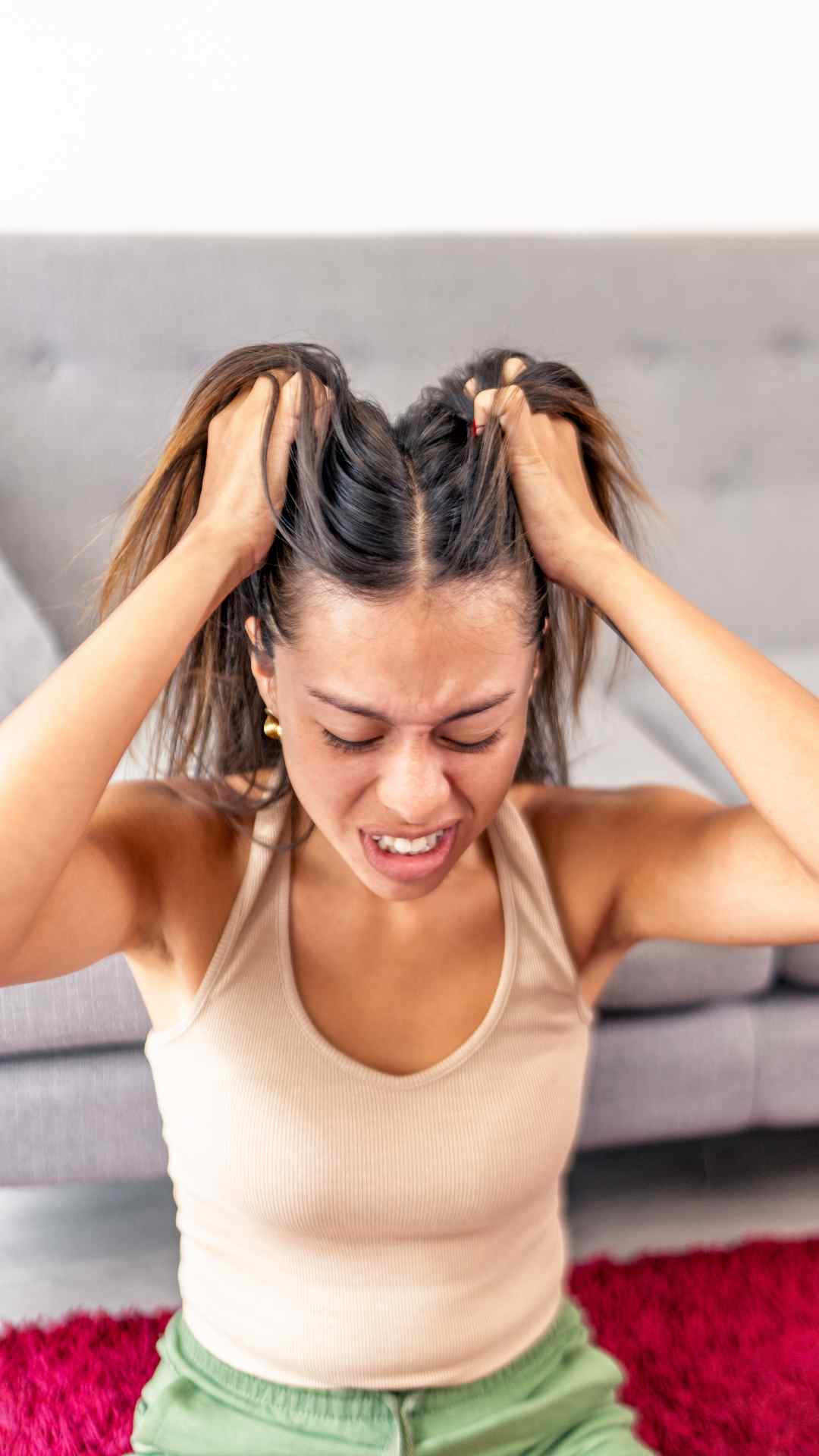 A-picture-of-a-woman-scratching-her-itchy-scalp-due-to-dandruff