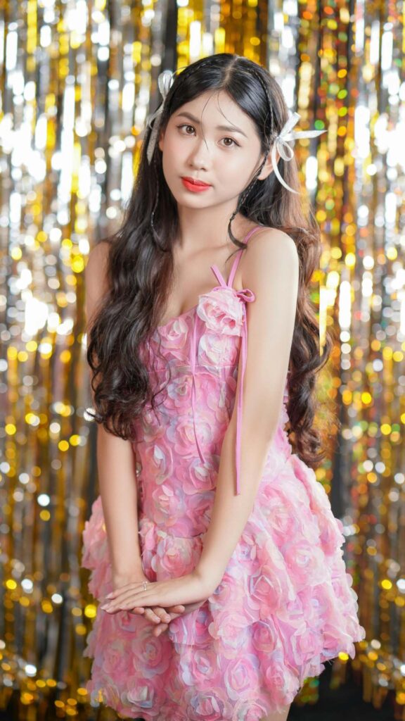 A-casual-wears-for-women-A-Woman-in-a-pink-floral-fitted-gown