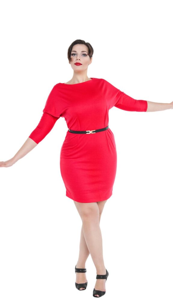 A-plus-size-woman-wearing-a-red-short-dress-as-her-valentine's-day-outfit