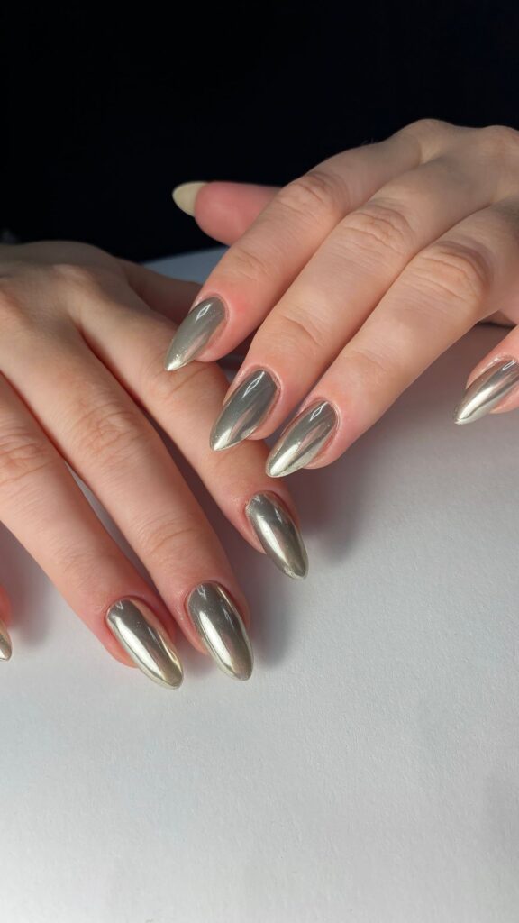 A-woman-that-painted-her-silver-for-30-new-year-nail-designs