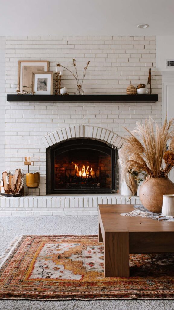 Living-room-interior-with-layered-textures-including-soft-rug-cushions-and- wooden-accents-to-create-depth-and-visual-interest.