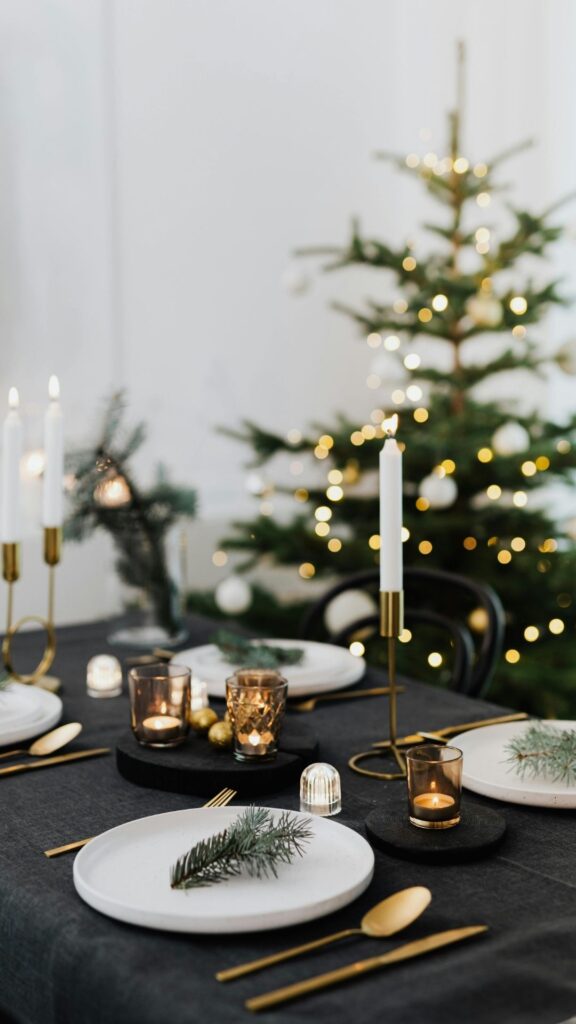 A-table-with black-linen-plates-cutleries-candles-and-glass-of-wine-showing-how-beautiful-a-fun-natural-table-setttings-can-be