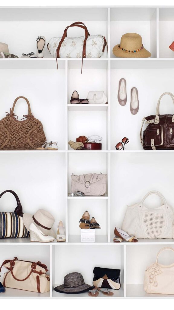 Aesthetic-accessories-for-a-stylish-look-including-shoes-eyeglasses-hat-and-bags-arranged-in-a-capsule-wardrobe-for-effortless-fashion.