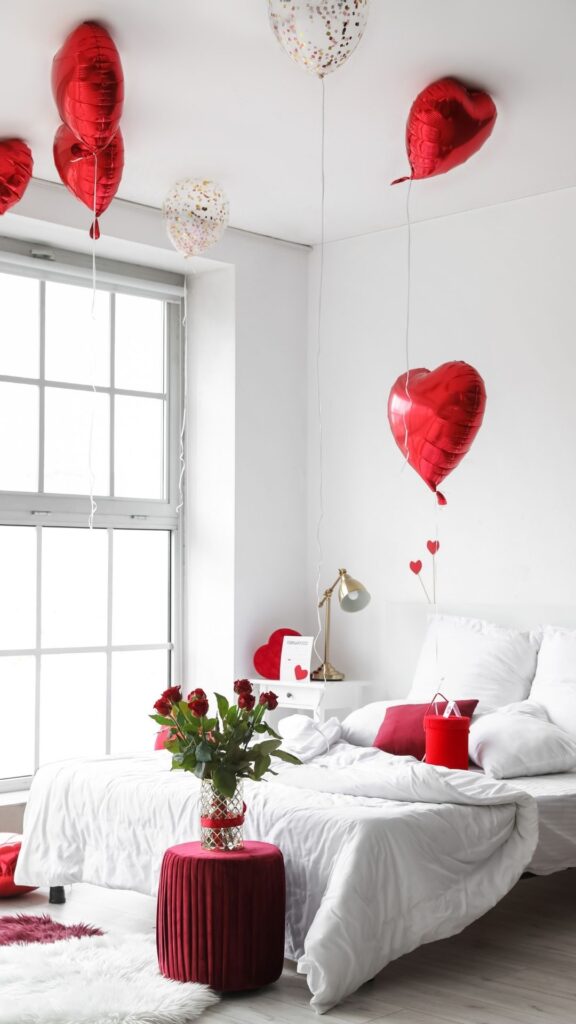 Bedroom-that-is-decorated-with-flowers-and-balloon-showing-how-valentines-day-home-decorations-is-done