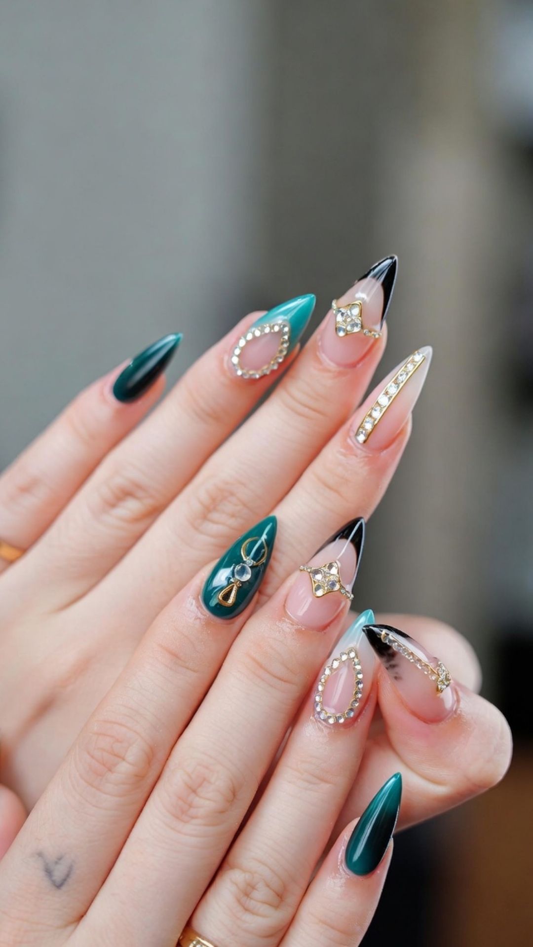 Featured-image-for-january-nail-ideas-showing-a-beautifully-painteed-nails-on-a-woman