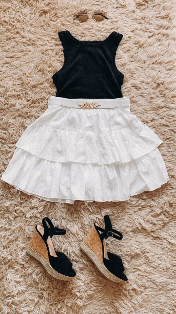 Image-of-flowy-skirt-and-black-top-showing-image-of-summer-outfit-ideas-for-women