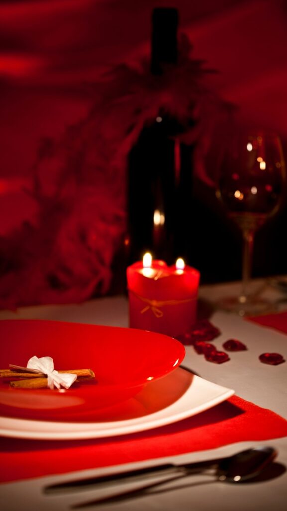 valentine-dining-table-decoration-showing-red-candle-plate-with-red-decoration