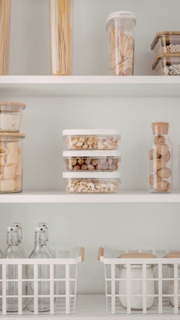 small-jars-of-food-items-in-a-well-arranged-kitchen-shelve
