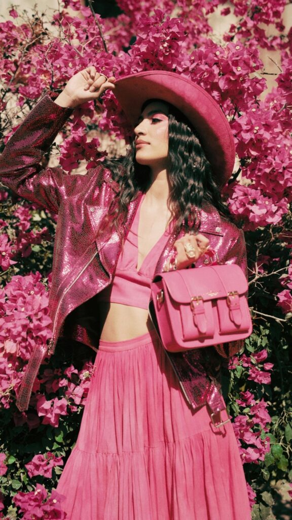 Woman-in-Pink-Outfit-Among-Vibrant-Bougainvillea