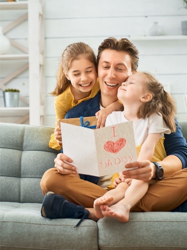 Father's-Day-Gift-Ideas-from-kids-showing-children-with-their-dad-with-hand-written-letter