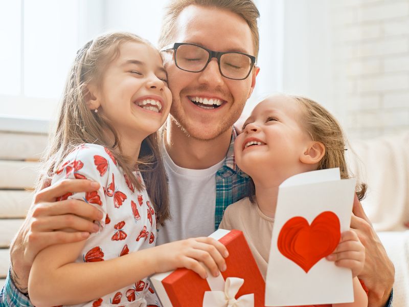 Featured-image-of-father-day-gift-ideas-from-kids-showing-children-gifting-their-dad