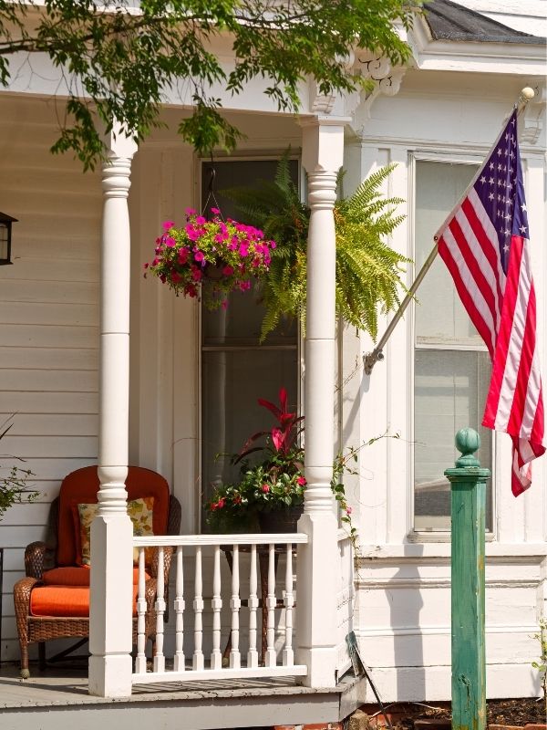 Front-Porch-With-Flags-and-Flowers-for-4th-of-july-decorations