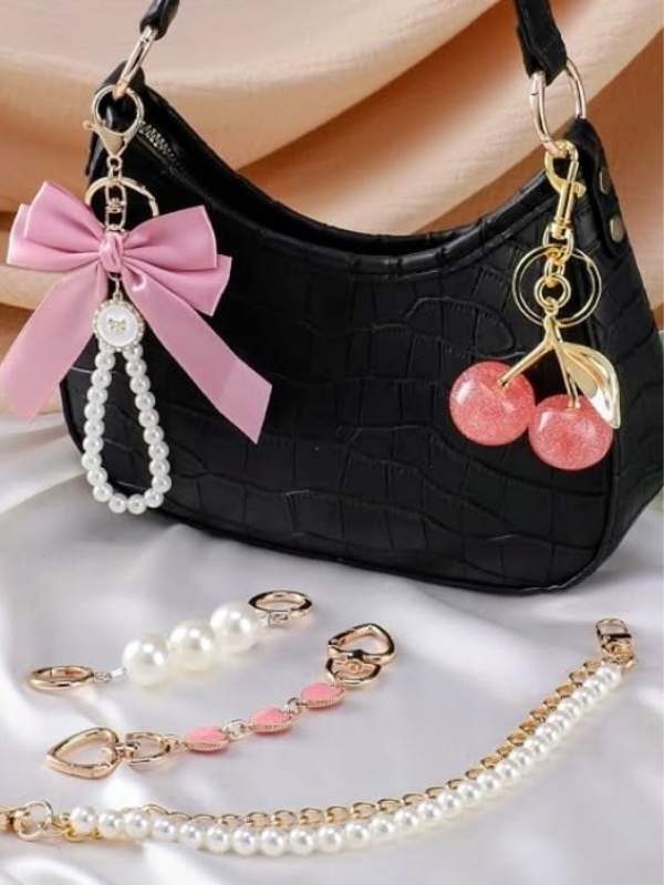 Black-bag-with-pink-bag-charms