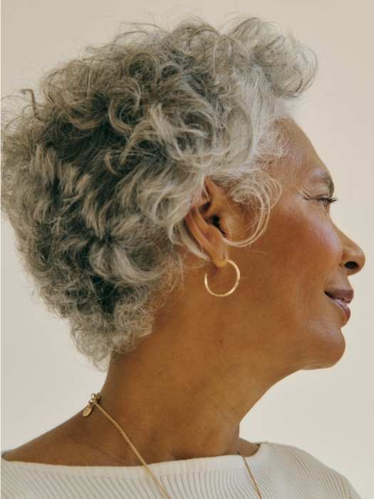 An-elderly-woman-on-Layered-Mid-Length-Cut
