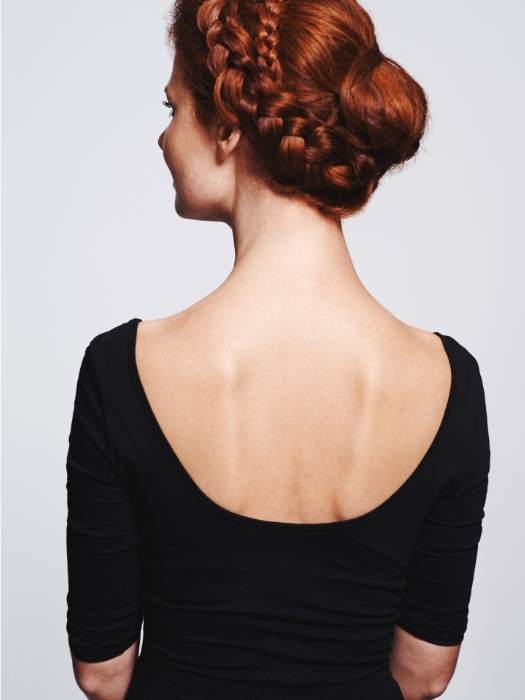 A-woman-on-twist-crown-style-best-hairstyles-for-swimming-that-prevent-tangles-and-breakage