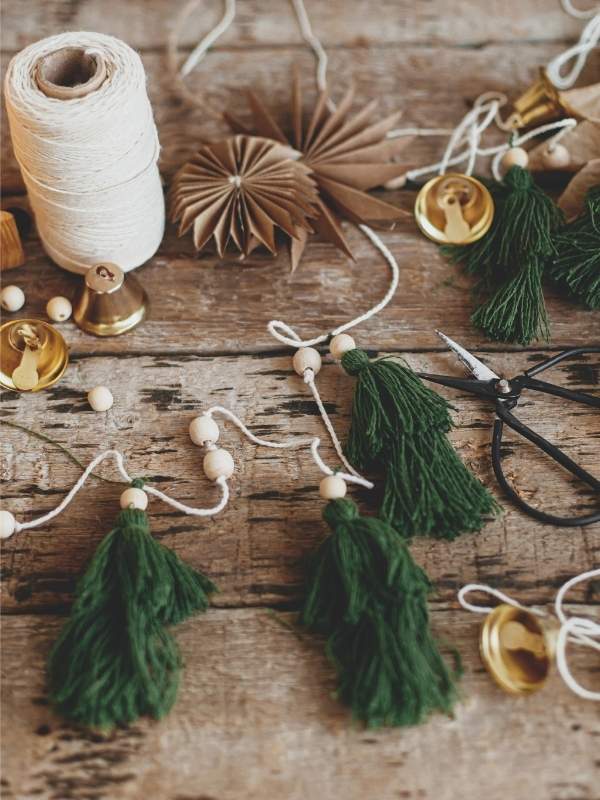 DIY-Rustic-Christmas-Garland-on-the-ground-as-Christmas crafts for adults