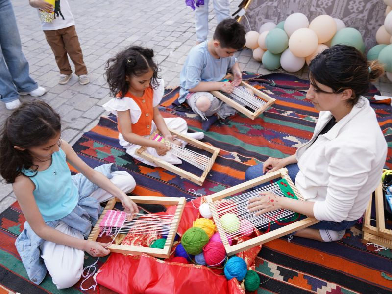 Featured-Image-of-10-Easy-Sensory-Craft-Ideas-for-Kids-with-Special-Needs-That-Support-Learning-showing-kids-learning-how-to-crochet