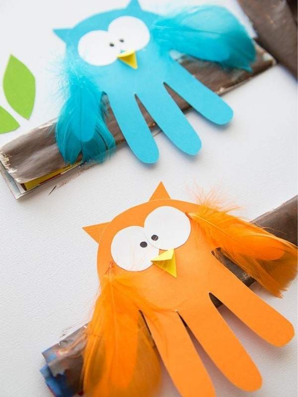 Handprint-Owl-Craft-that-has-blue-color-and-orange-color