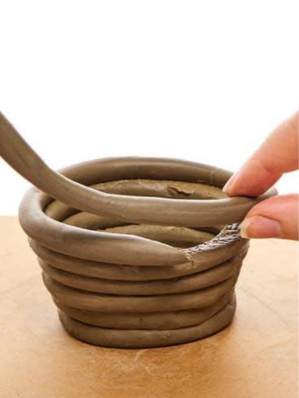 photo-showing-a-second-or-third-coil-being-placed-on-top-of-the-base-layer