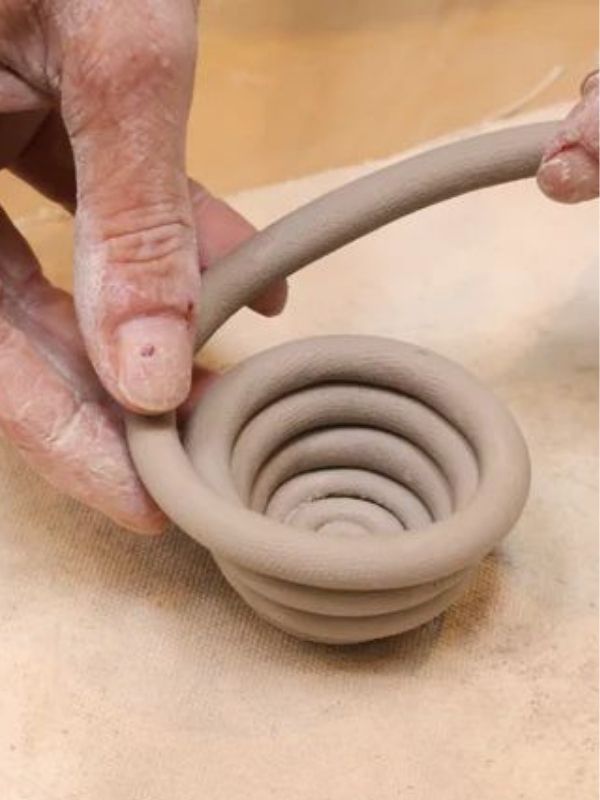 Image-of-The-first-coil-of-the-pot-been-attached