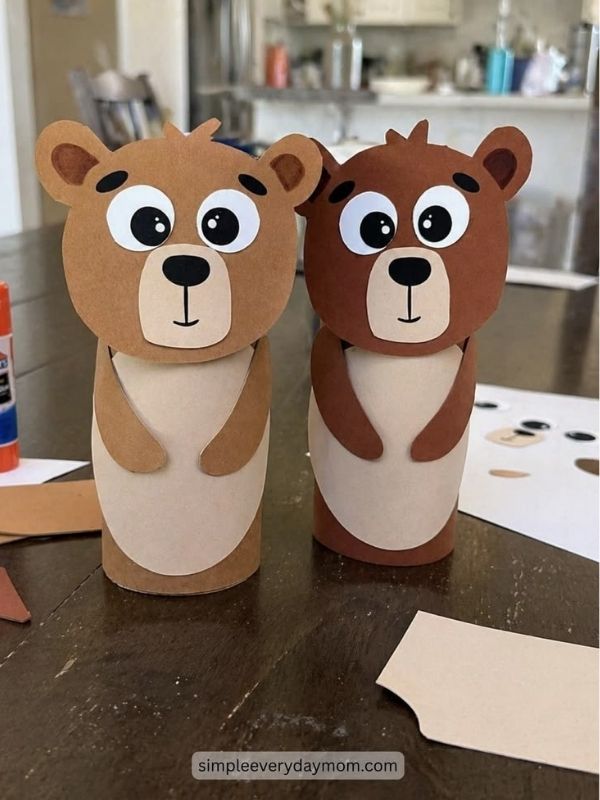 Image-of-2-bear-crafts-on-the-table-made-with-brown-paper-and-tissue-roll-as-preschool-camping-crafts