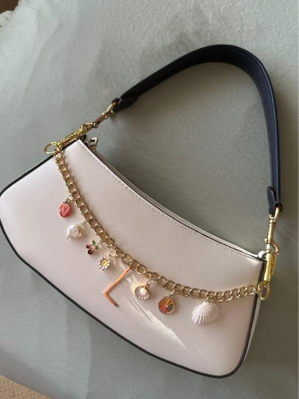 An-Image-of-a-bag-with-Chain-and-bag-charm-hanged-around-the-bag