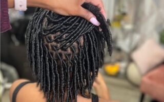 Featured-Image-of-Comb-Coils-for-Starter-Locs-showingg-image-of-a-woman-seated-down-while-another-person-is-making-her-locs