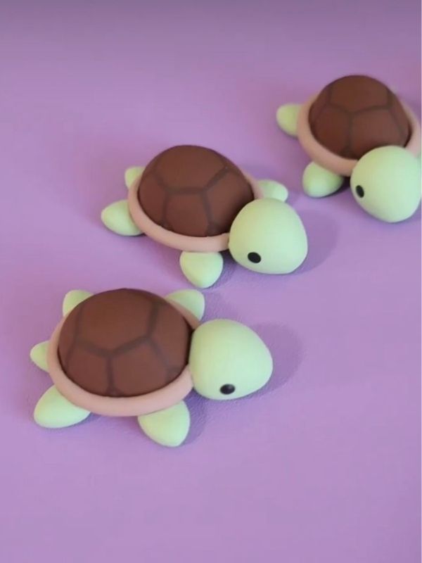 Image-of-Turtles-made-with-clay-in-a-purple-background