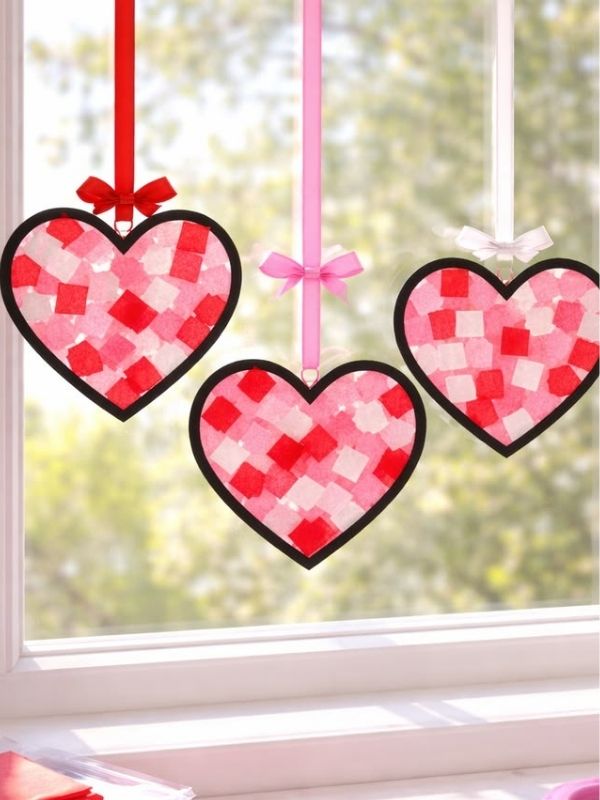 An-image-of-paper-hearts-that-is-kept-at-the-window-as-suncatchers